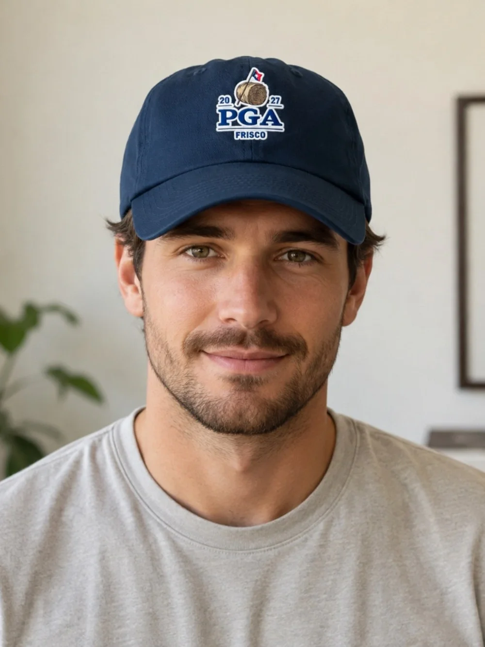 Description: Imperial golf cap in navy blue featuring an embroidered 2027 PGA Fr